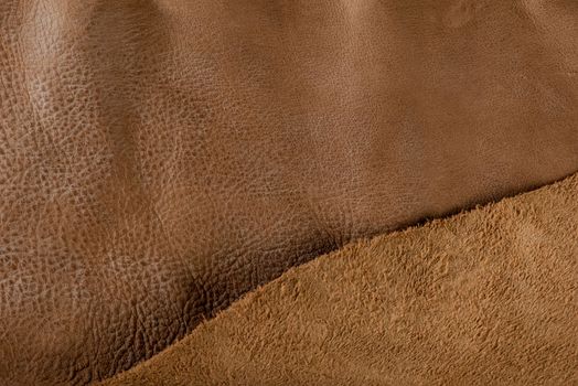 Texture of brown leather. Texture of natural brown leather. Background for design or project.