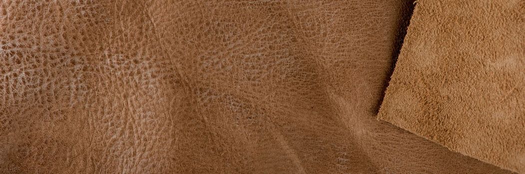 Texture of brown leather. Texture of natural brown leather. Background for design or project.