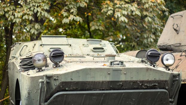 Soviet-made armored vehicles on the street. Soviet and Russian armored personnel carrier or infantry fighting vehicle