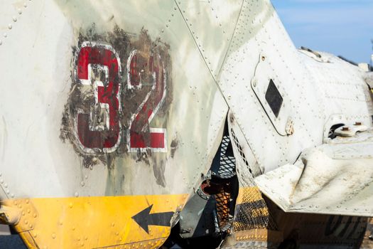 Burnt parts of the destroyed Russian Air Force combat helicopter Hind Crocodile. The wreckage of a downed helicopter. War in Ukraine. Broken military attack helicopter close-up