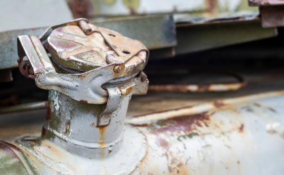 Large old truck, close-up view of the fuel tank on the left. Gas tank. Tank with a capacity of 300 liters