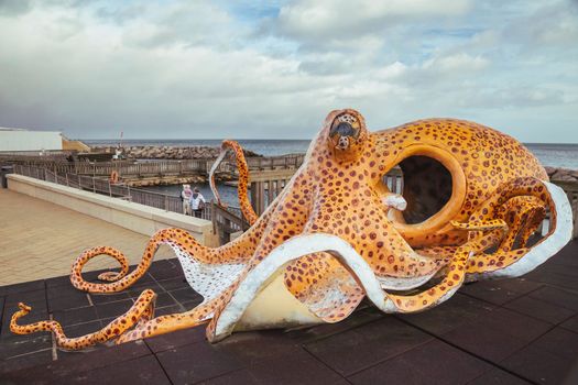 Huge decorative octopus on the playground in a Danish port city Grenaa Havn 