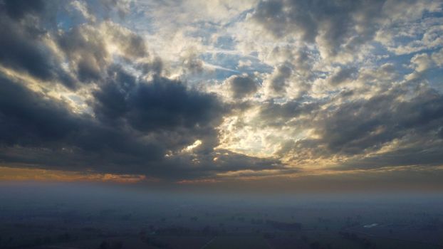 Stagno Lombardo, Italy - November 2022 drone view of rural area near river Po at dusk