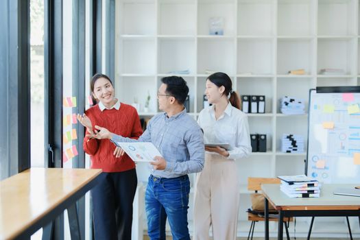 Asian entrepreneurs and business people meeting in a conference room in business planning, financial budget and investment risk assessment to analyze customer groups to increase company growth.