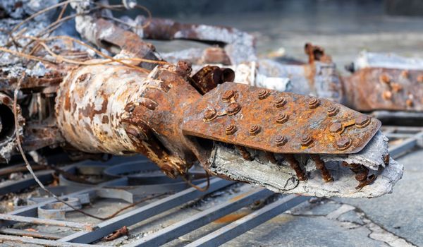 Detail of the Mi-24 helicopter. Remains of a destroyed Russian Air Force combat helicopter Hind Crocodile. Engine rotor, blades, tail, wreckage of a crashed military attack helicopter close-up