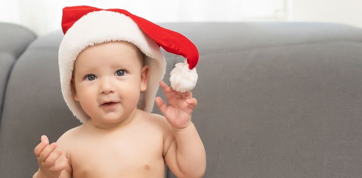 Christmas little baby boy, baby in santa hat