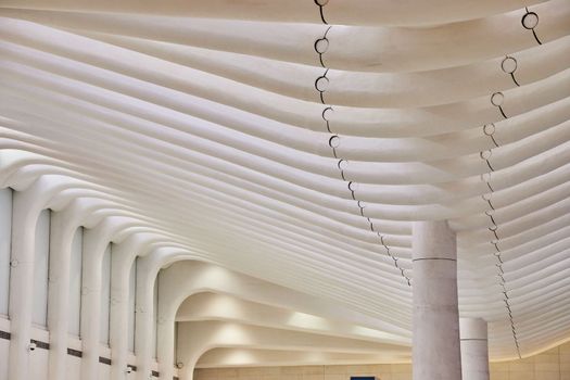 Image of Clean white interior architecture ceiling with pillars and white ribs