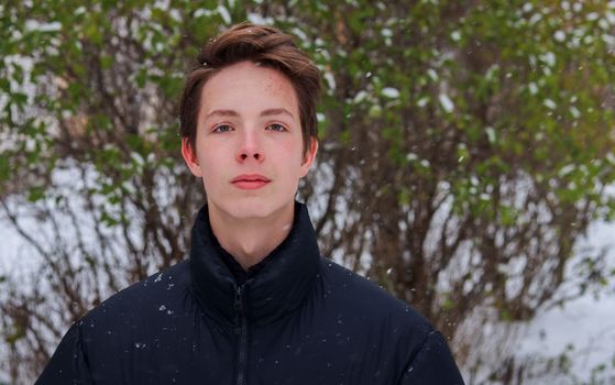 Cute teenager posing outdoors on a winter day.