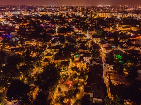 Night top aerial view of the old town Kaleici and old harbor in Antalya, Turkey. Turkey is a popular tourist destination.