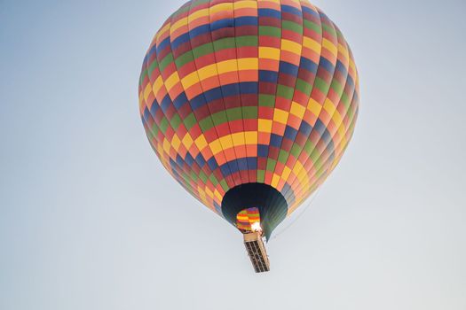 Beautiful hot air balloons over blue sky.