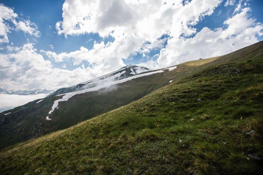 Fabulous magnificent view of Caucasus Mountains and sky. High quality photo