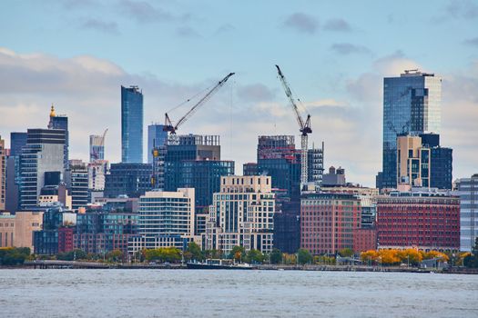 Image of Buildings under construction in skyline of New Jersey by river