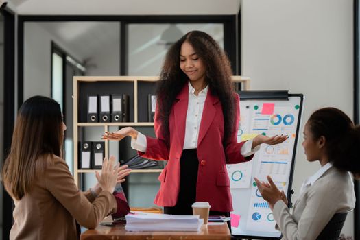 Young African American businesswoman working with partner at office. finance concept.