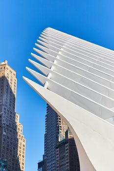 Image of White clean rib building architecture exterior in New York City WTC by skyscrapers