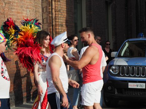 Cremona Pride, a rainbow city. The streets crowded with people celebrating on the day dedicated to claiming the rights of the LGBTQIA community.