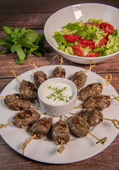 Recipe of kefta, beef skewer, Traditional homemade, with Greek yoghurt sauce, garlic, savory, Arabic and Libanese food, High quality photo
