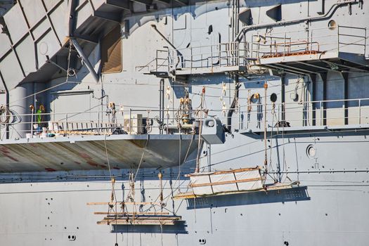 Image of Side detail of platforms on aircraft carrier American military ship for navy