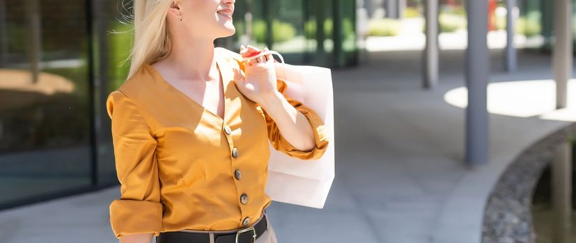 woman walking with shopping bags, christmas.