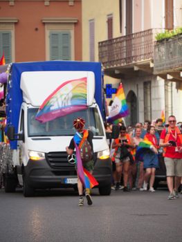 Cremona Pride, a rainbow city. The streets crowded with people celebrating on the day dedicated to claiming the rights of the LGBTQIA community.