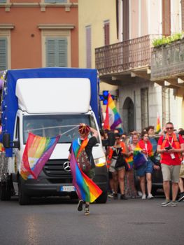 Cremona Pride, a rainbow city. The streets crowded with people celebrating on the day dedicated to claiming the rights of the LGBTQIA community.