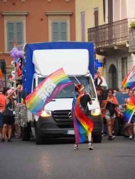 Cremona Pride, a rainbow city. The streets crowded with people celebrating on the day dedicated to claiming the rights of the LGBTQIA community.