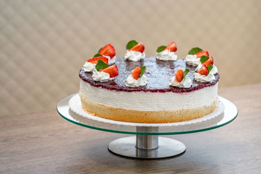 fruit cake with marmalade and whipped cream.