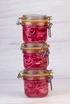 RECIPE FOR ONION PICKLES IN JARS, WHITE WINE VINEGAR, WHITE WINE, SUGAR, PEPPER. High quality photo