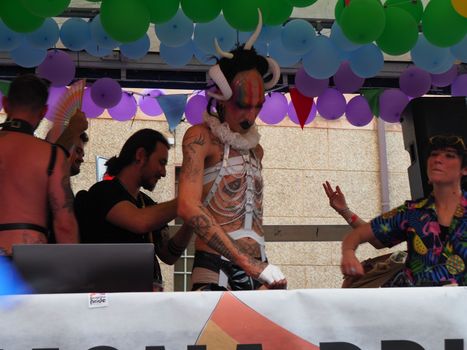 Cremona Pride, a rainbow city. The streets crowded with people celebrating on the day dedicated to claiming the rights of the LGBTQIA community.