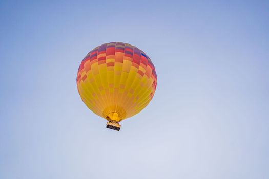 Beautiful hot air balloons over blue sky.