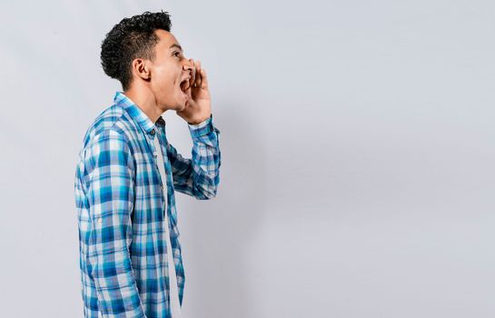 People yelling and announcing a promotion, Person shouting and announcing a banner. Side profile handsome guy yelling an announcement, isolated