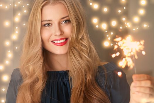 Holiday magic, Christmas and New Year celebration, happy woman with sparklers, portrait