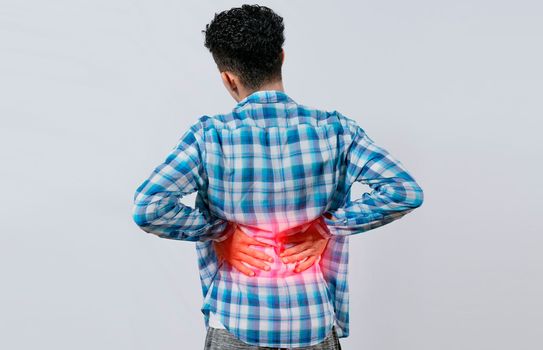 Man with spine and lower back problems, people with lower back pain isolated, lumbar problems concept, a sore man with back pain. Unrecognizable people with lower back pain