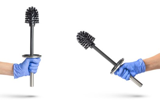 Toilet brush in hand on a white isolated background, a hand in a blue rubber glove holds a black chrome toilet brush