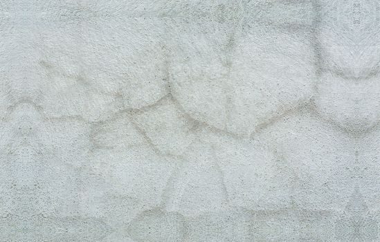 Details of a textured gray wall, Granite textured gray wall background. Texture of a gray wall. Gray wall of house with texture, Cracked gray wall background