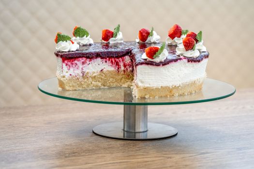 fruit cake with marmalade and whipped cream.