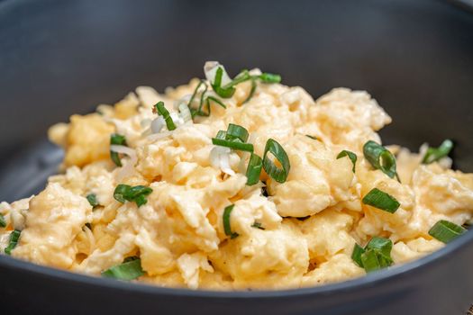 scrambled eggs with fresh green onions.