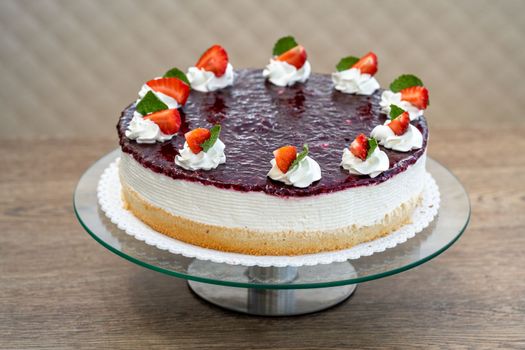 fruit cake with marmalade and whipped cream.