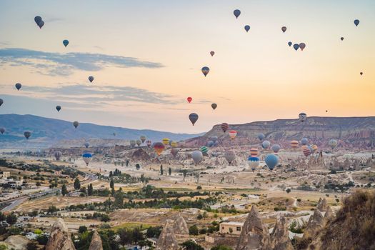 Colorful hot air balloon flying over Cappadocia, Turkey.