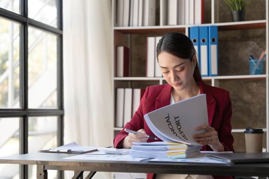 Young Business Asian women are stressed while working on laptop, Tired asian businesswoman with headache at office, feeling sick at work copy space in workplace an home office...