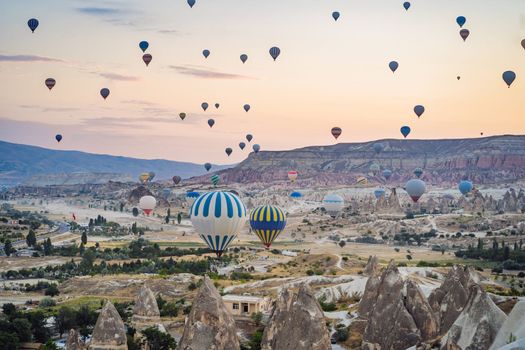 Colorful hot air balloon flying over Cappadocia, Turkey.