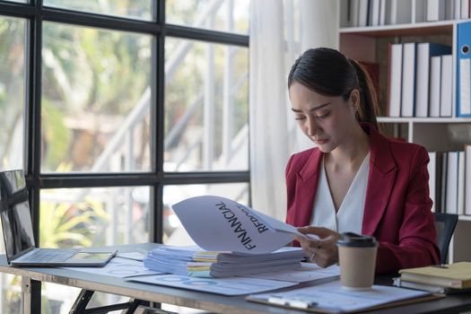 Young Business Asian women are stressed while working on laptop, Tired asian businesswoman with headache at office, feeling sick at work copy space in workplace an home office...