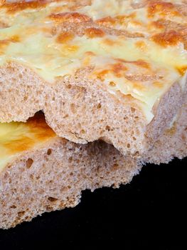 itaian flat bread focaccia with mozzarella cheese topping on white background