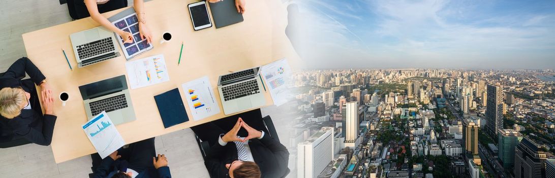 Business people group meeting shot from top widen view in office . Profession businesswomen, businessmen and office workers working in team conference with project planning document on meeting table .