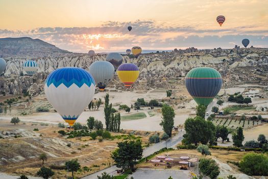 Colorful hot air balloon flying over Cappadocia, Turkey.