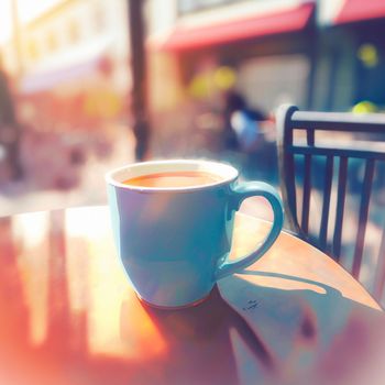 A mug of hot tea in the morning in a cafe. High quality photo