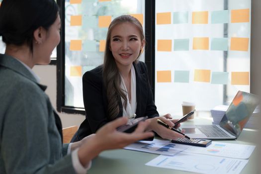 Group of business consultant working management big data and analyze financial document of company.