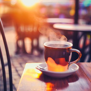 A mug of hot tea in the morning in a cafe. High quality photo