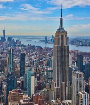 Image of Stunning panorama vertical of Empire State Building New York City with Manhattan behind from high up view