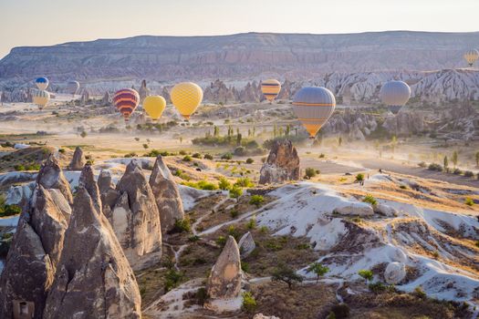 Colorful hot air balloon flying over Cappadocia, Turkey.