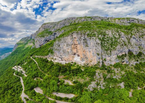 Monastery of Ostrog, Serbian Orthodox Church situated against a vertical background, high up in the large rock of Ostroska Greda, Montenegro. Dedicated to Saint Basil of Ostrog.